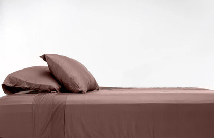 100% Bamboo Luxury Sheet in Purple Fitted on a Bed