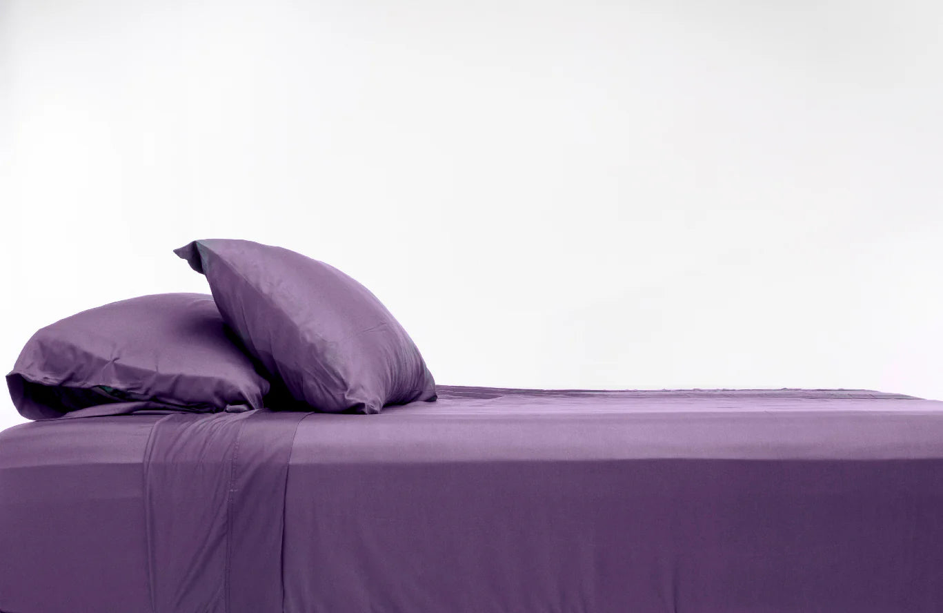 100% Bamboo Luxury Sheet in Purple Fitted on a Bed