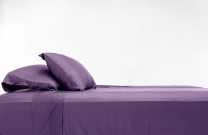 100% Bamboo Luxury Sheet in Purple Fitted on a Bed