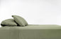 100% Bamboo Luxury Sheet in Sage Fitted on a Bed