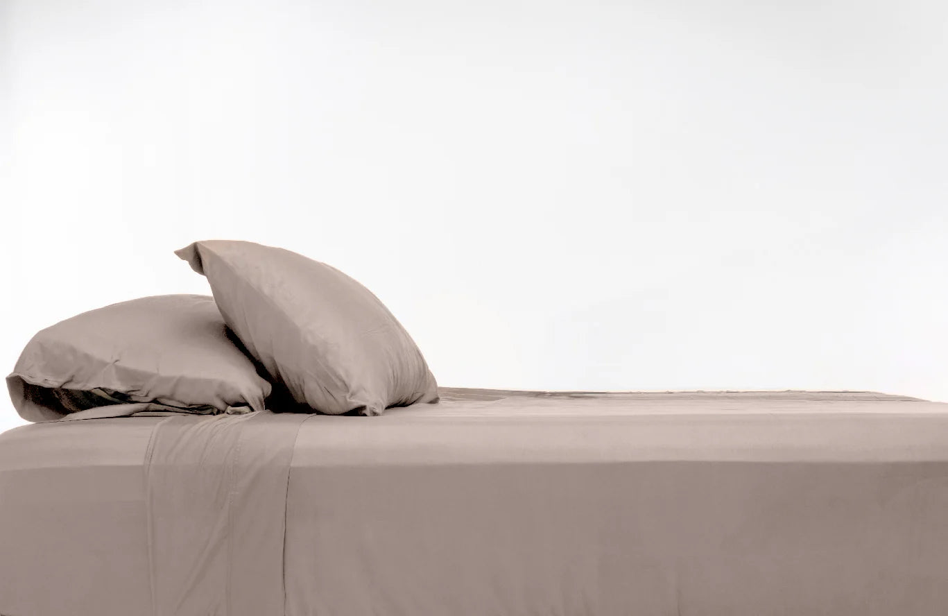 100% Bamboo Luxury Sheet in Tan Fitted on a Bed