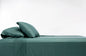 100% Bamboo Luxury Sheet in Teal Fitted on a Bed